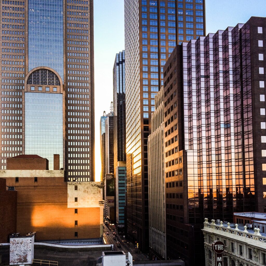 Downtown Dallas office towers lit by late afternoon sun
